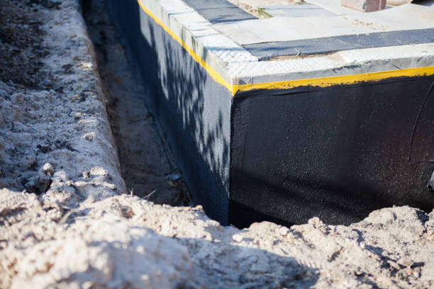 Professional Waterproofing technician working in Oakdale, TN
